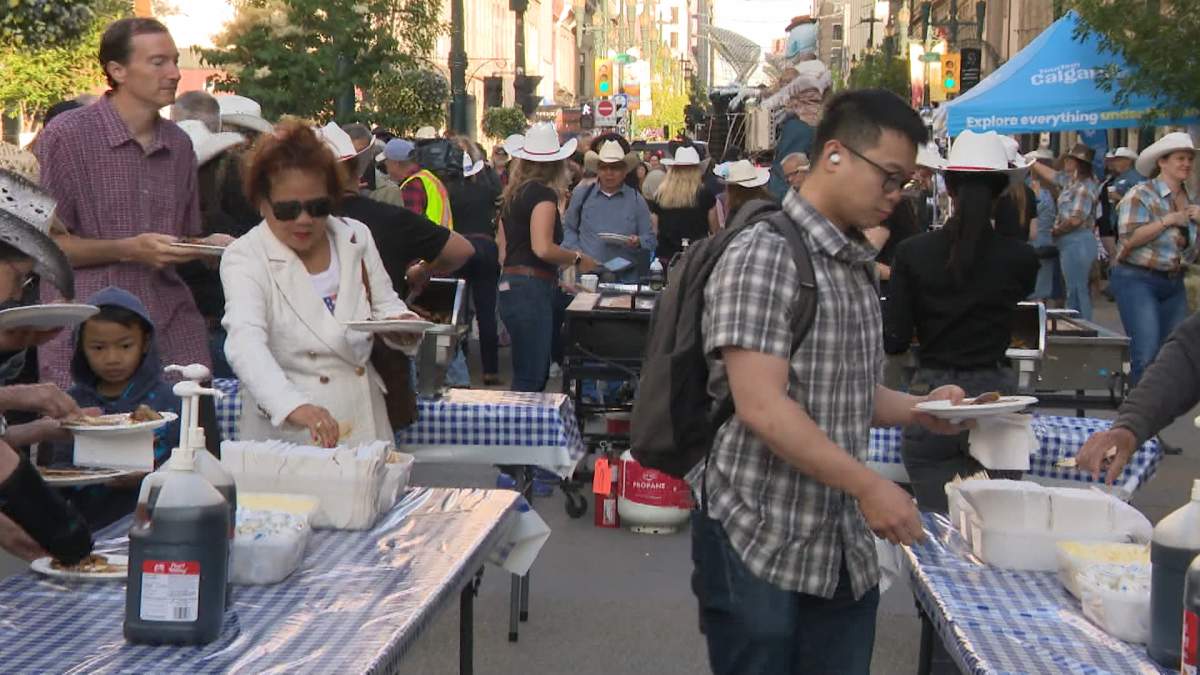 A huge crowd of people gathered on the Stephen Avenue mall in Calgary on Thursday morning for the 'First Flip' pancake breakfast to help kick off the 2025 Calgary Stampede festivities.