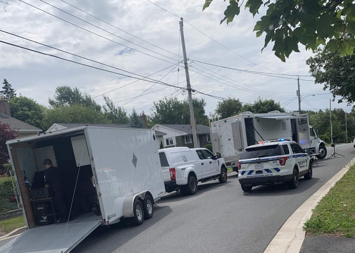 Halifax police and navy members removed and safely detonated a live grenade that was thrown outside a home in Dartmouth, N.S. on July 15, 2025.