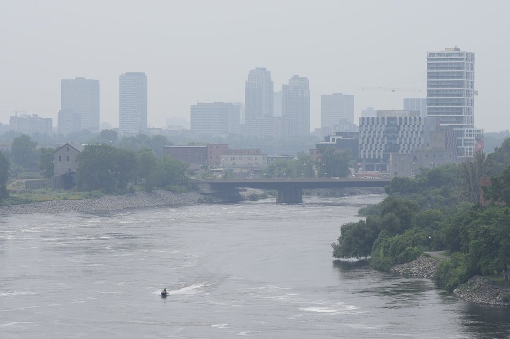 A watercraft makes its way along the Ottawa river in Ottawa on Monday, July 14, 2025. 
