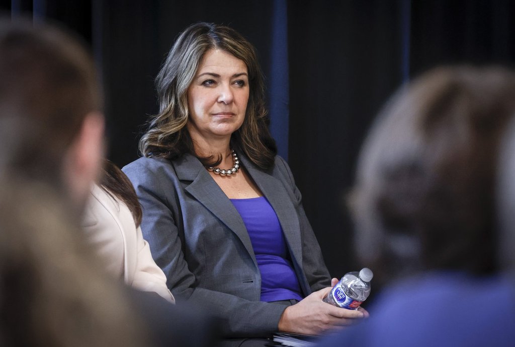Alberta Premier Danielle Smith listens to speakers after announcing the "New North America Initiative", led by the University of Calgary’s School of Public Policy in Calgary, Friday, May 16, 2025.