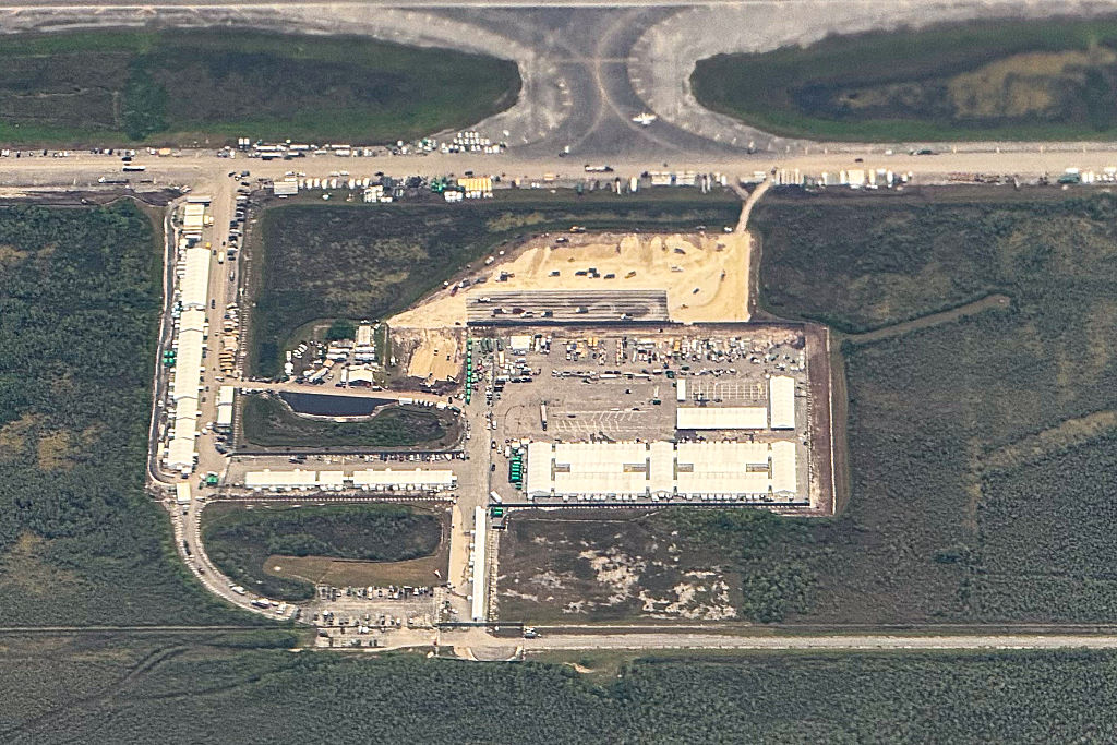 An aerial view of a migrant detention centre, dubbed "Alligator Alcatraz," is seen located at the site of the Dade-Collier Training and Transition Airport in Ochopee, Florida on July 7, 2025.