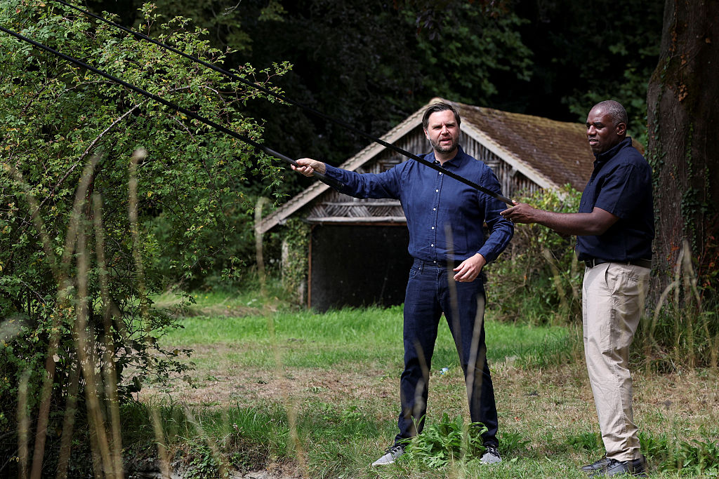 U.S. Vice President JD Vance fishes with British Foreign Secretary David Lammy at Chevening House on August 8, 2025 in Sevenoaks, England.
