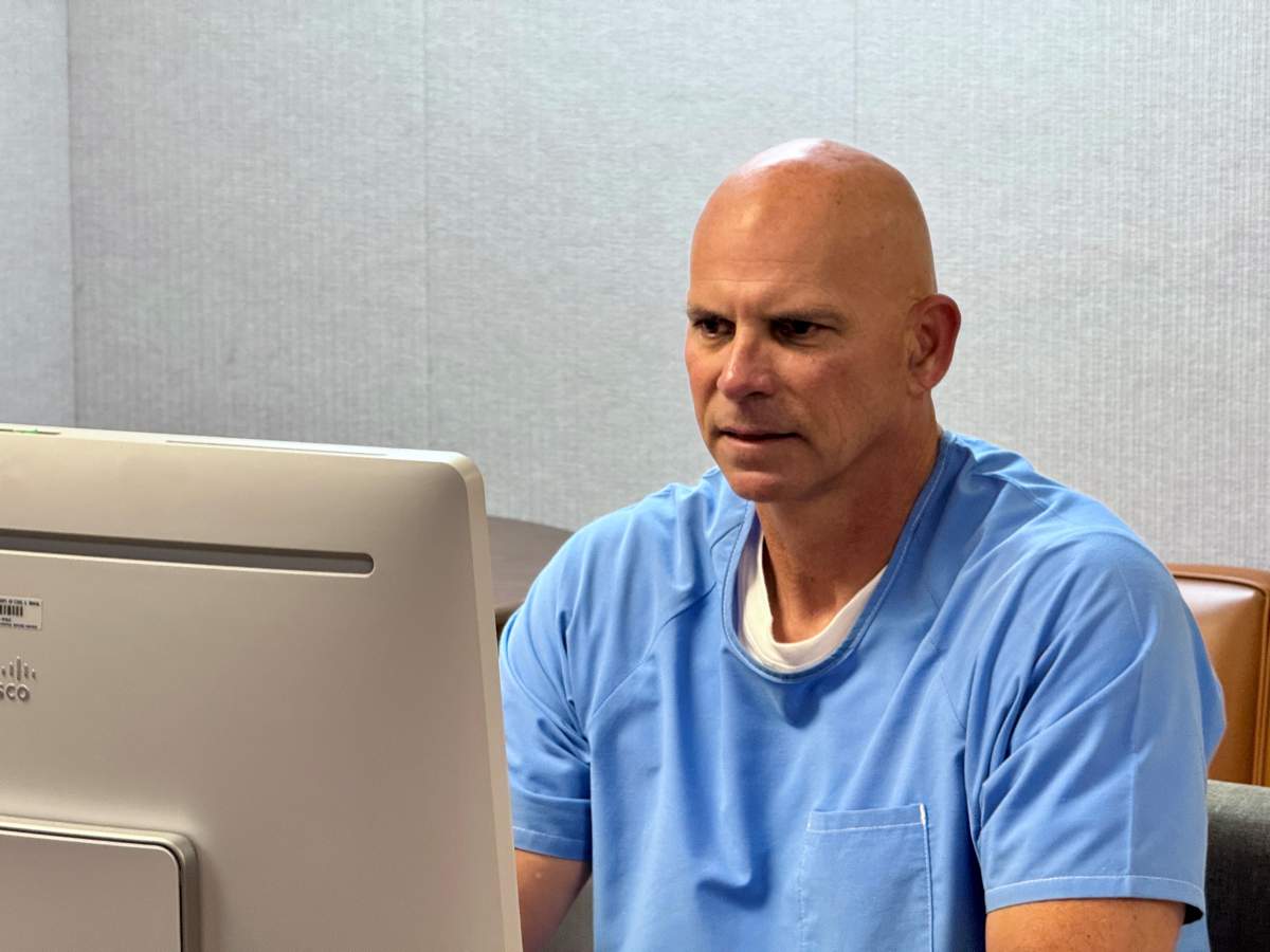 In this handout photo provided by the California Department of Corrections, Lyle Menendez appears before the parole board via teleconference at the Richard J. Donovan Correctional Facility on August 22, 2025, in San Diego, California.