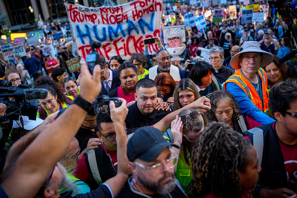 Kilmar Abrego Garcia (C) and his wife Jennifer Vasquez Sura (Center Right) enter a U.S. Immigration and Customs Enforcement (ICE) field office on August 25, 2025 in Baltimore, Maryland.