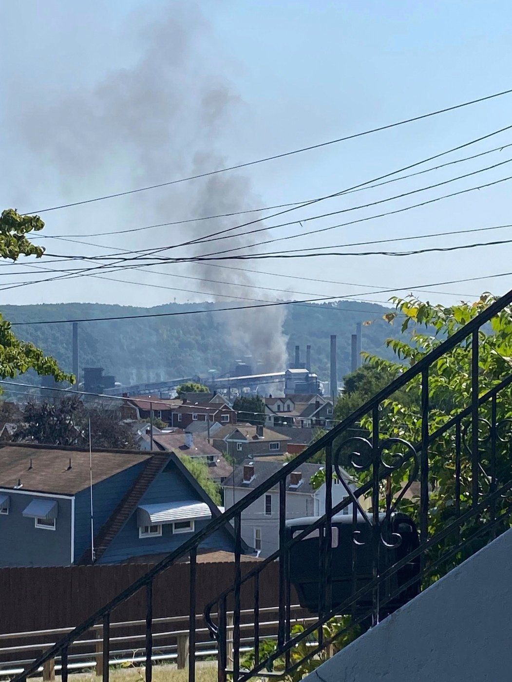 This image provided by Amy Sowers shows smoke from the U.S. Steel Clairton Coke Works, Monday, Aug. 11, 2025 in Clairton, Pa. (Amy Sowers via AP)