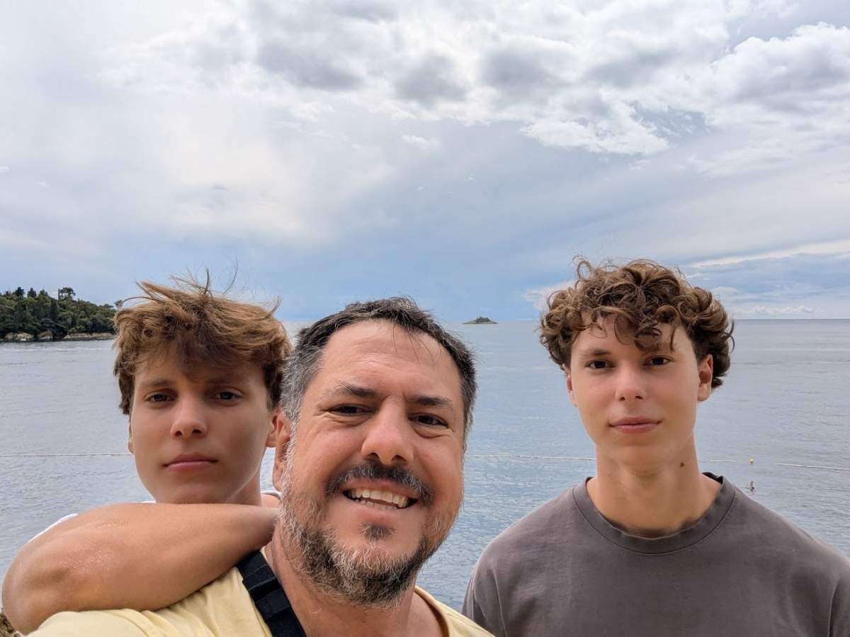 Bojan Gilic and his two sons are currently stranded in Italy as they await their re-booked flights back to Kelowna.