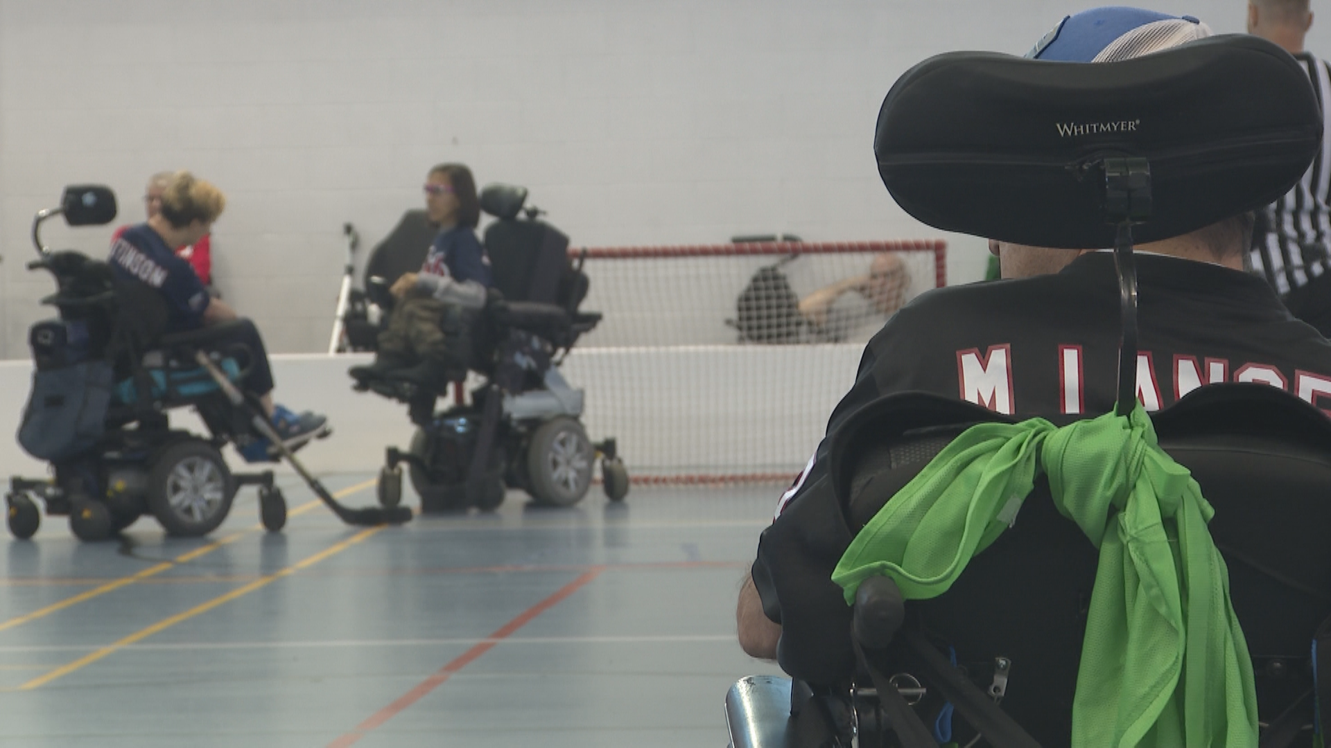 Powerchair athletes playing in the finals.