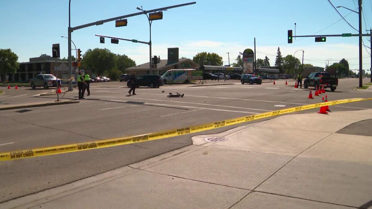 A vehicle and e-scooter collided in the intersection of 51 Avenue and 106 Street in south Edmonton on July 31, 2025.