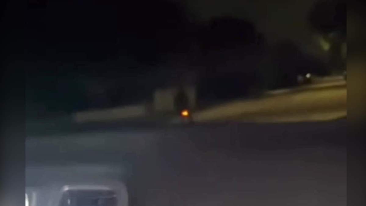 Still from a video showing a cyclist being deliberately hit by a vehicle in north Edmonton on Monday, Aug. 4, 2025.