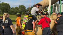 Firefighters in Connecticut rescue a 40-year-old man who became wedged inside a children's slide.