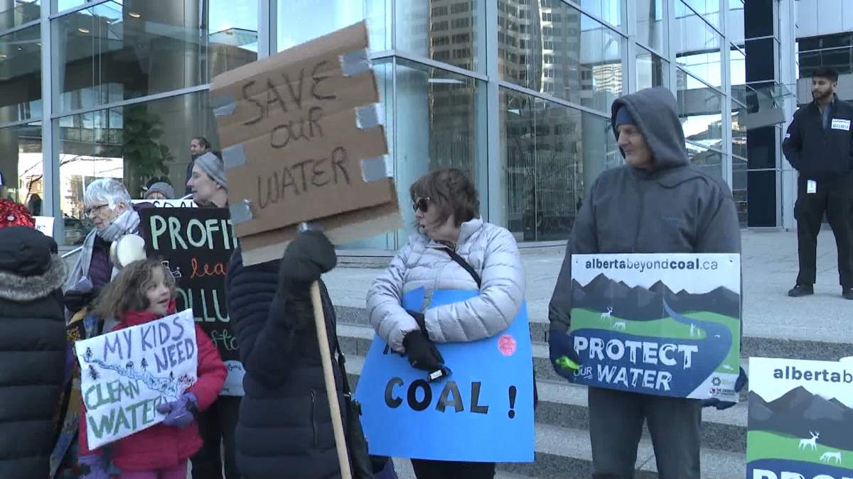 Protestors gather outside the offices of the Alberta Energy Regulator in January 2025, where a hearing on Northback Holdings proposal to explore for coal in the Grassy Mountain area of southern Alberta was being held. The AER eventually approved the company's plan.