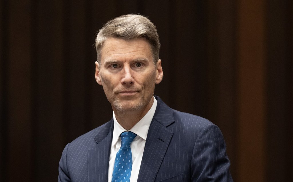 Minister of Housing and Infrastructure Gregor Robertson waits to appear as a witness at the House of Commons transport committee on Parliament Hill in Ottawa, Friday, Aug. 1, 2025. THE CANADIAN PRESS/Adrian Wyld.