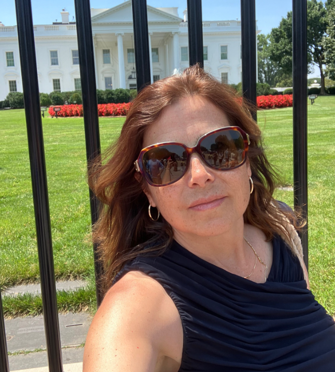 Nathalie Jones poses in front of the White House in a photo posted her to Facebook page in July 2025.