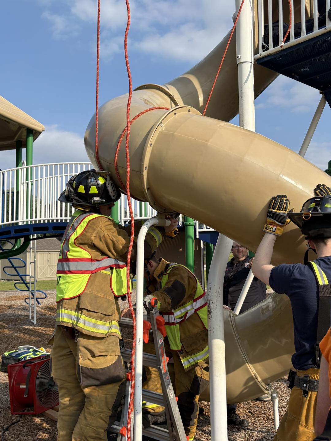 Firefighters in Connecticut rescue a 40-year-old man who became wedged inside a children's slide.