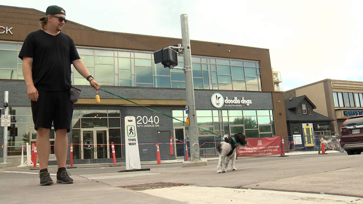Marda Loop dog owner Logan McEachern said he's hopeful all the construction will improve the community in the long run, but it is difficult to watch businesses being forced to close in the short run.