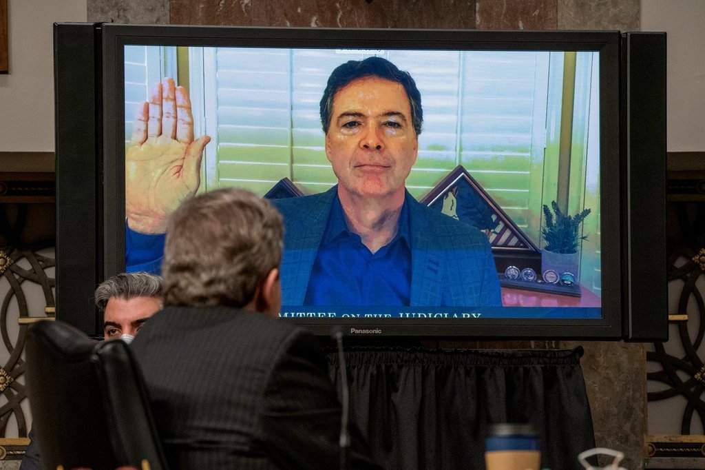 Former FBI director James Comey is sworn via videoconference before testifying during a Senate Judiciary Committee hearing on Capitol Hill in Washington, Wednesday, Sept. 30, 2020, to examine the FBI "Crossfire Hurricane" investigation.