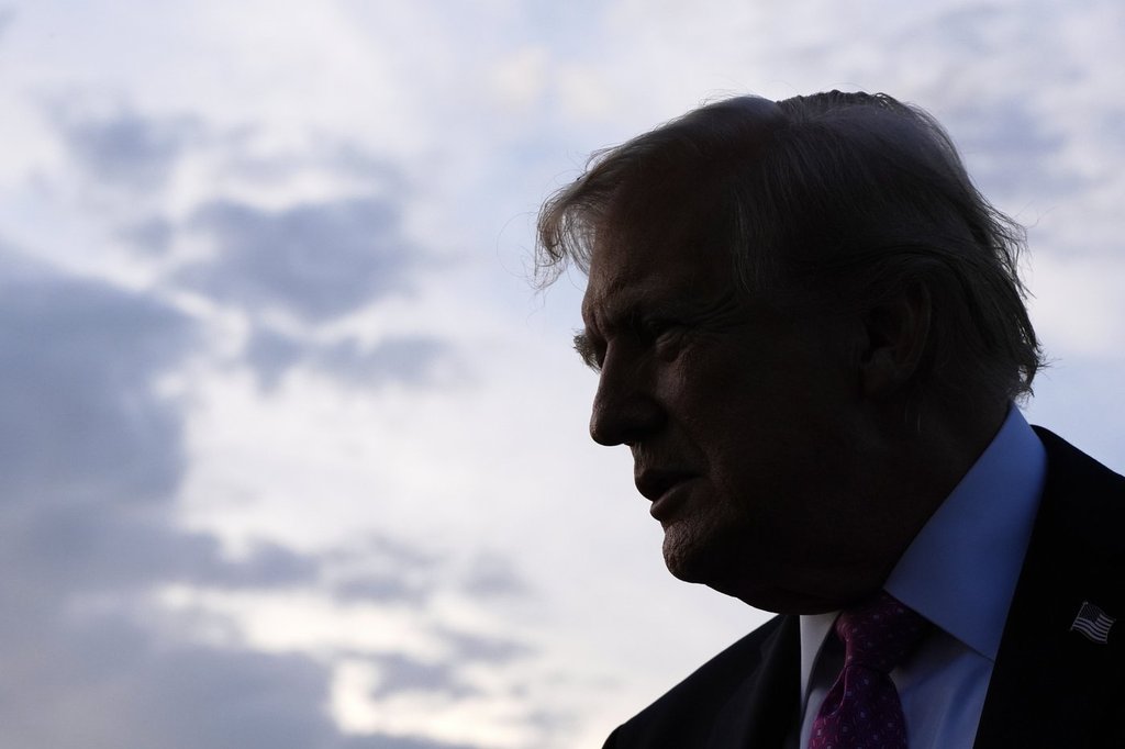 FILE - President Donald Trump speaks with reporters before boarding Air Force One at Morristown Airport, Sept. 14, 2025, in Morristown, N.J. (AP Photo/Alex Brandon, File).