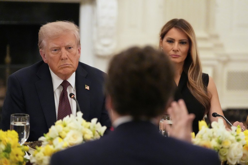 President Donald Trump and first lady Melania Trump listen during a dinner in the State Dinning Room of the White House, Thursday, Sept. 4, 2025, in Washington. (AP Photo/Alex Brandon).