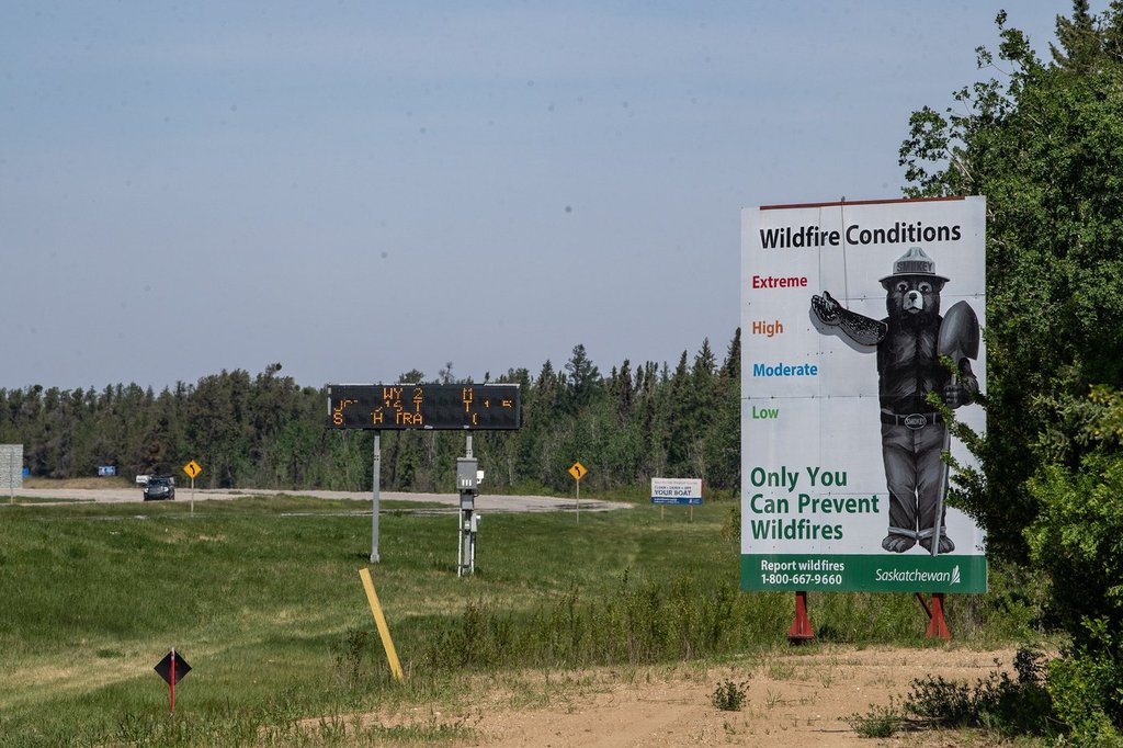 Signage on Highway 2 North near the Provincial Wildfire Center in Prince Albert, Sask., Wednesday, June 4, 2025. THE CANADIAN PRESS/Liam Richards.