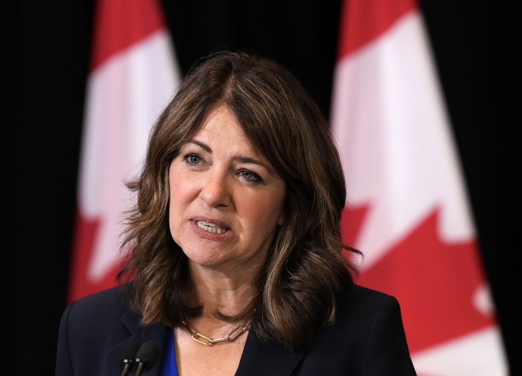 Alberta Premier Danielle Smith speaks to the media after signing a memorandum of understanding with Ontario and Saskatchewan during the 2025 summer meetings of Canada's premiers at the Deerhurst Resort in Huntsville, Ont., on Tuesday, July 22, 2025.