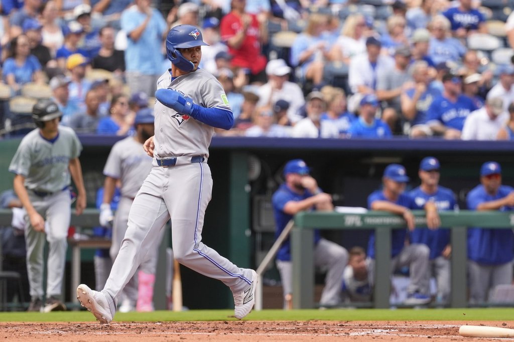 Blue Jays clinch playoff spot with win over Royals