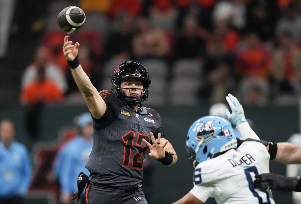 B.C. Lions quarterback Nathan Rourke (12) passes during the first half of a CFL football game against the Toronto Argonauts, in Vancouver, on Friday, September 26, 2025. THE CANADIAN PRESS/Darryl Dyck.