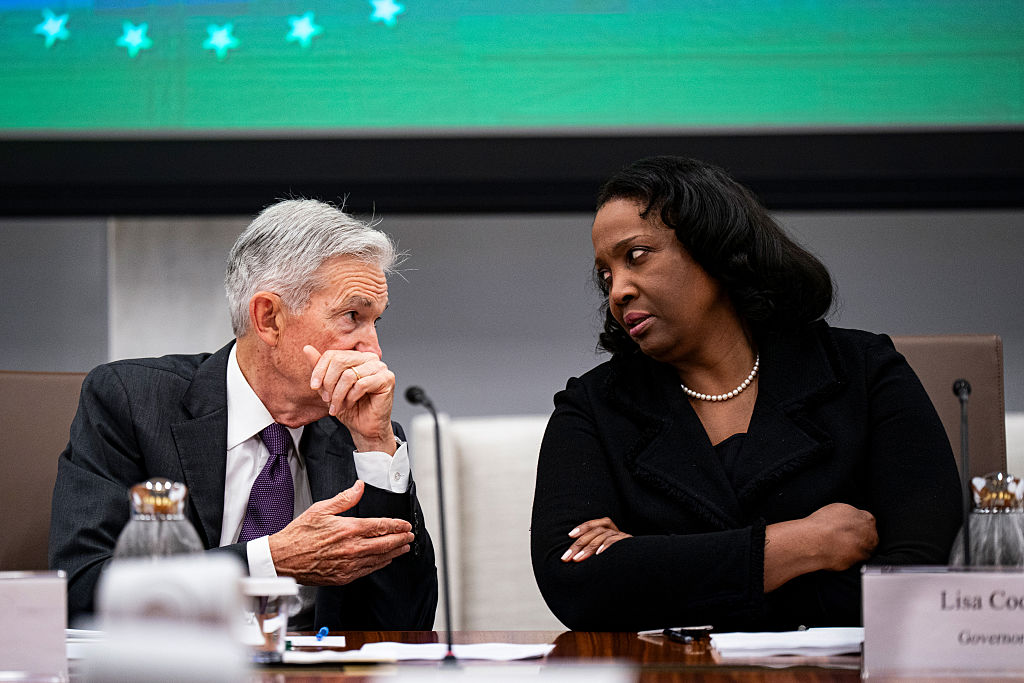 Jerome Powell, chairman of the US Federal Reserve, left, and Lisa Cook, governor of the US Federal Reserve, during the Federal Reserve Board open meeting in Washington, DC, US, on Wednesday, June 25, 2025.