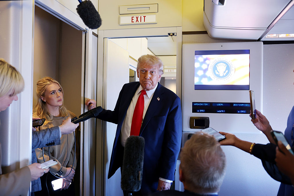 U.S. President Donald Trump speaks to reporters on Air Force One on September 18, 2025 during a flight to Joint Base Andrews, Maryland. Trump concluded his state visit to the United Kingdom by spending the day at Chequers with British Prime Minister Keir Starmer.
