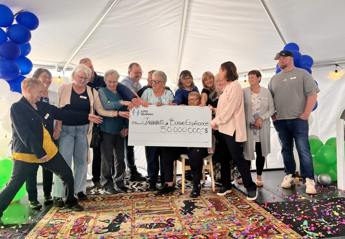 A $50 million Lotto Max win has shocked a tiny Quebec fishing village, but the 14 new millionaires say they’re not going anywhere.