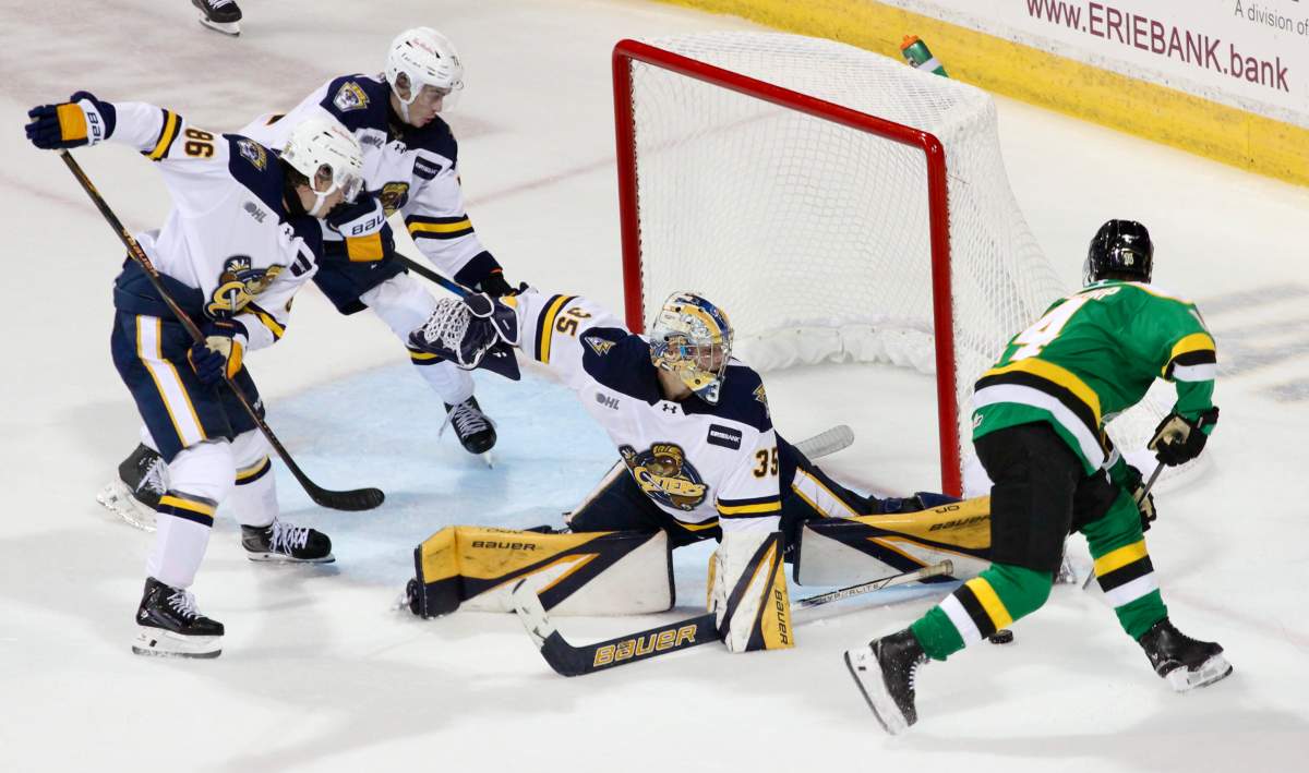 Evan Van Gorp of the London Knights gets a chance in tight on the Erie Otters net in a game played at the Erie Insurance Arena on Sept. 27, 2025.