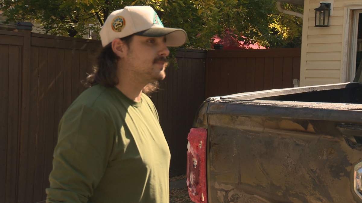 Rylan Wheeler stands behind his truck – the only thing left to his name following a fire in Seton on Saturday night.