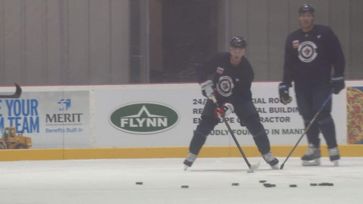 Jonathan Toews skates with the Winnipeg Jets.