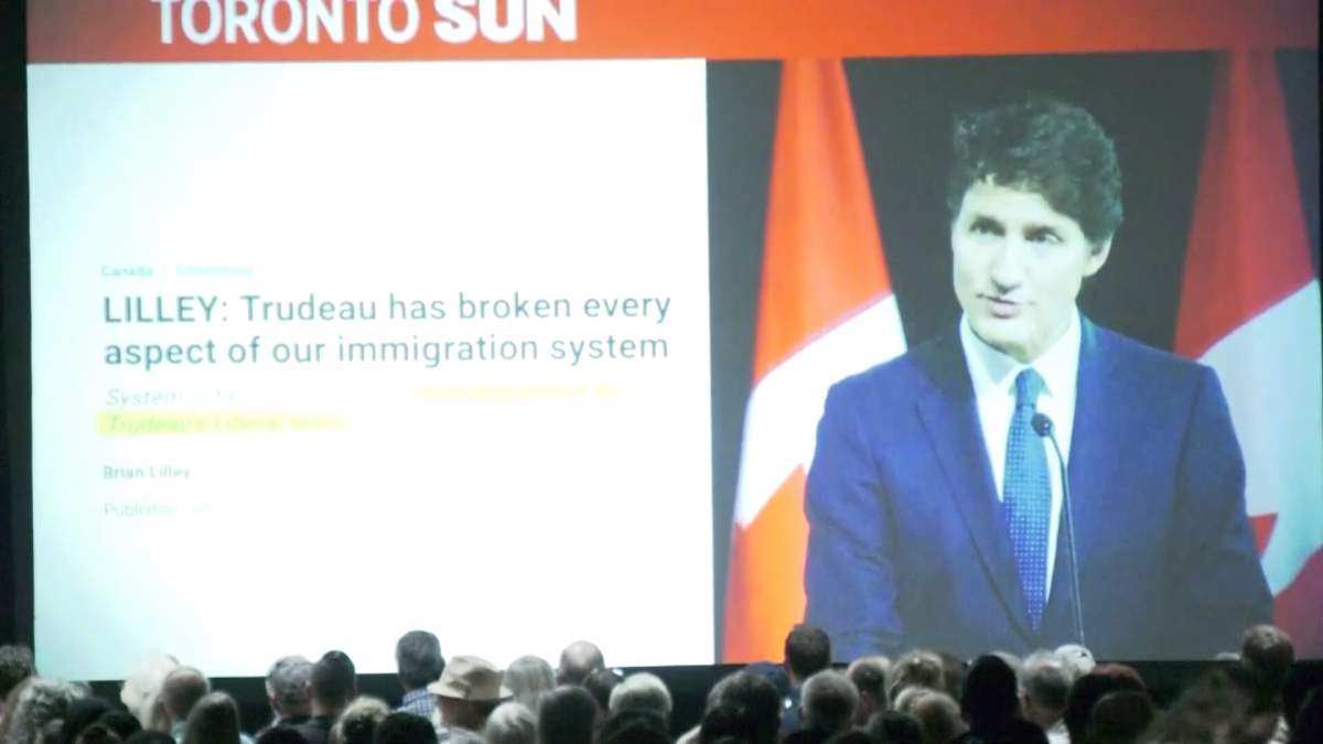 A slide featuring an image of former Prime Minister Justin Trudeau, among many used in the the panel's slide show criticizing how the federal government has treated Alberta.