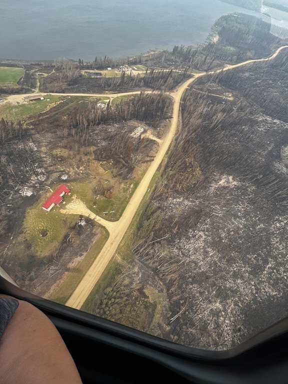 Wildfire destruction is seen from the air in Chipewyan Lake, a hamlet within the Municipal District of Opportunity No. 17 in northern Alberta, in an undated handout photo. A wildfire destroyed about half of the structures in the remote community this summer.