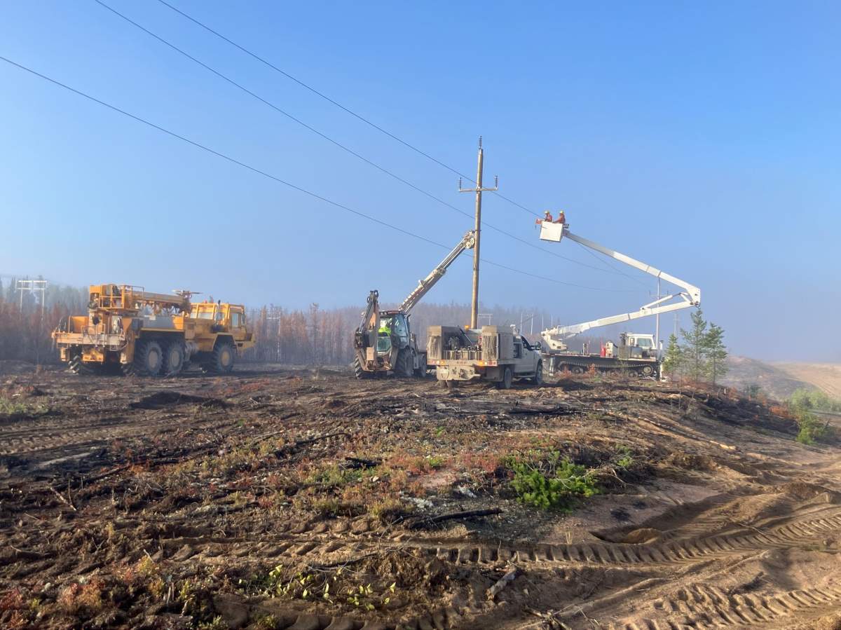 Manitoba Hydro crews work to restore power in northern communities hit hard by summer wildfires.
