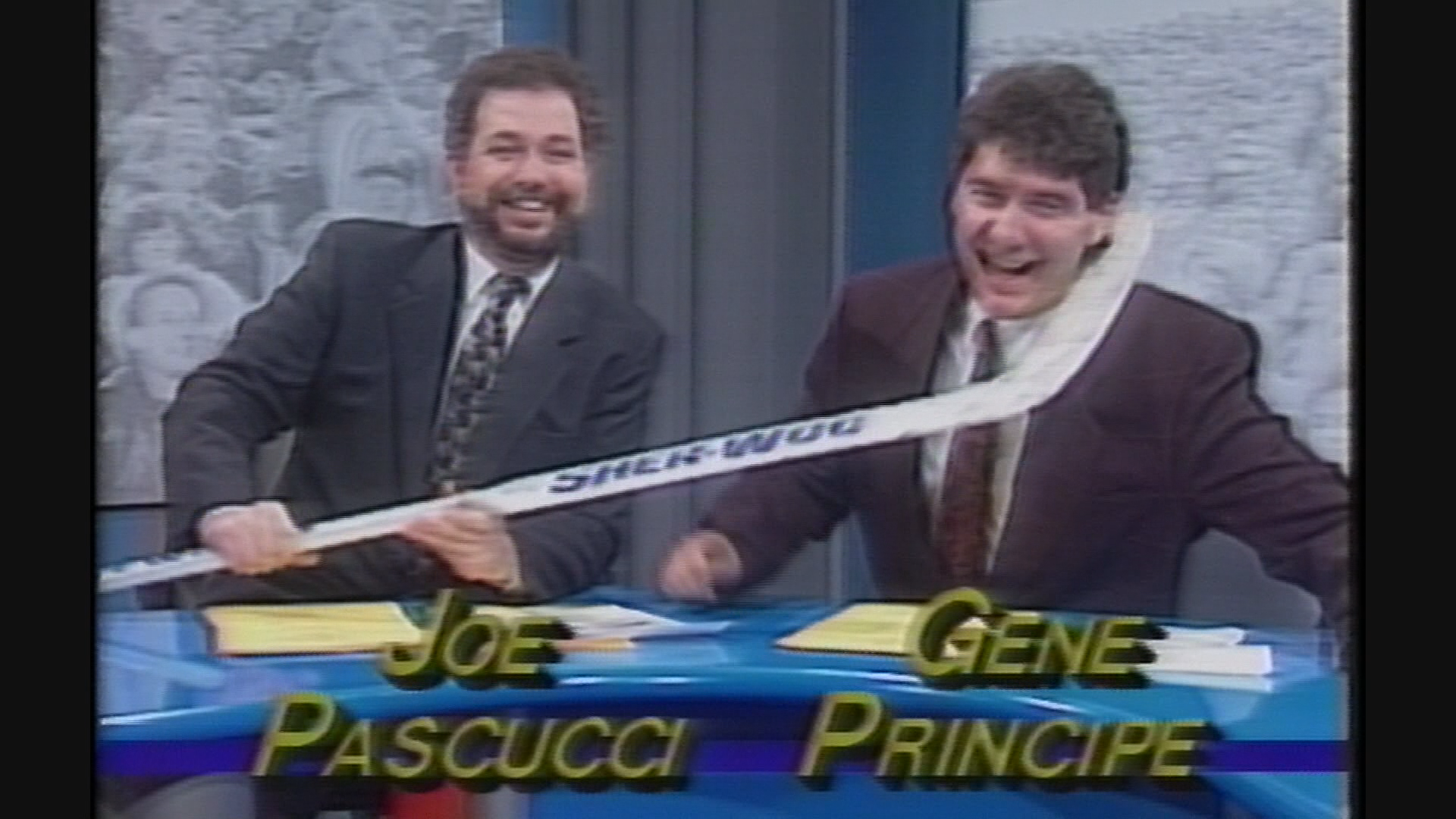 Joe Pascucci and Gene Principe on the sports desk.