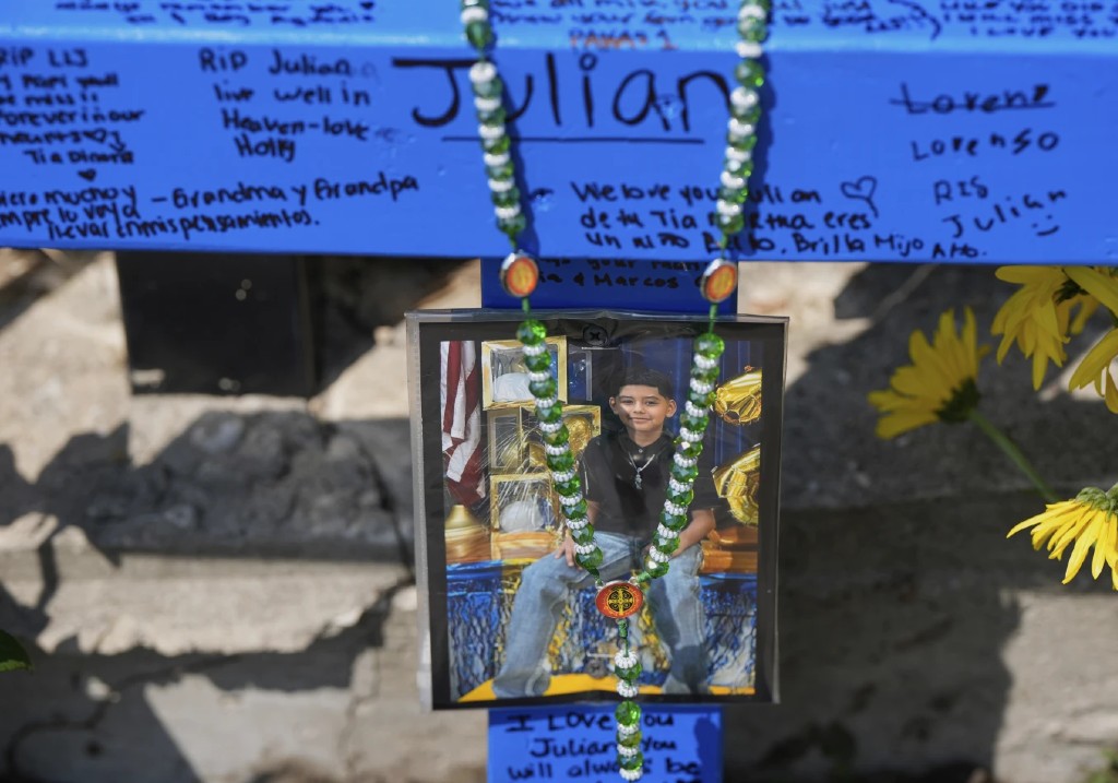 A makeshift memorial for 11-year-old Julian Guzman, who was shot and killed during a doorbell prank, is shown Tuesday, Sept. 2, 2025, in Houston.