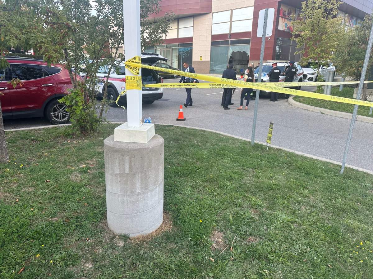 Police at the scene after a vehicle drove into a Richmond Hill, Ont. daycare.