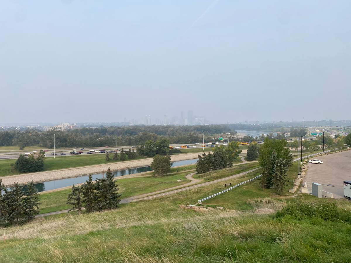 Downtown Calgary is obscured by heavy smoke in the photo from Max Bell arena in northeast Calgary on Monday morning.