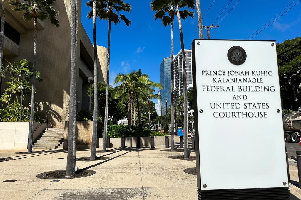 FILE - A sign for the Prince Jonah Kuhio Kalanianaole Federal Building and Courthouse is displayed outside the courthouse on Jan. 22, 2024, in Honolulu. (AP Photo/Jennifer Kelleher, File).