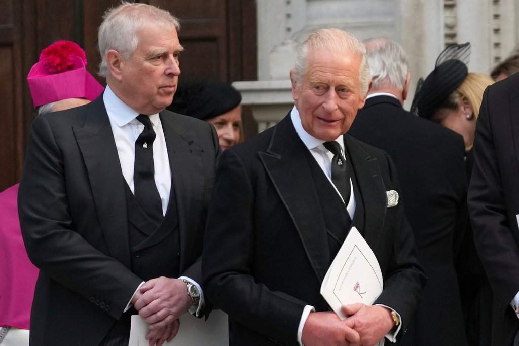 FILE - Britain's Prince Andrew, left, and Britain's King Charles III leave after the Requiem Mass service for the Duchess of Kent at Westminster Cathedral in London, Tuesday, Sept. 16, 2025.