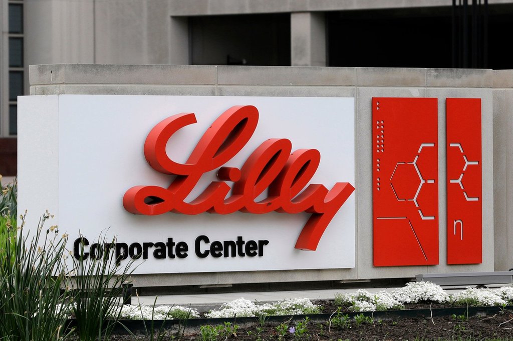 FILE - A sign for Eli Lilly & Co. stands outside their corporate headquarters in Indianapolis on April 26, 2017. (AP Photo/Darron Cummings, File).