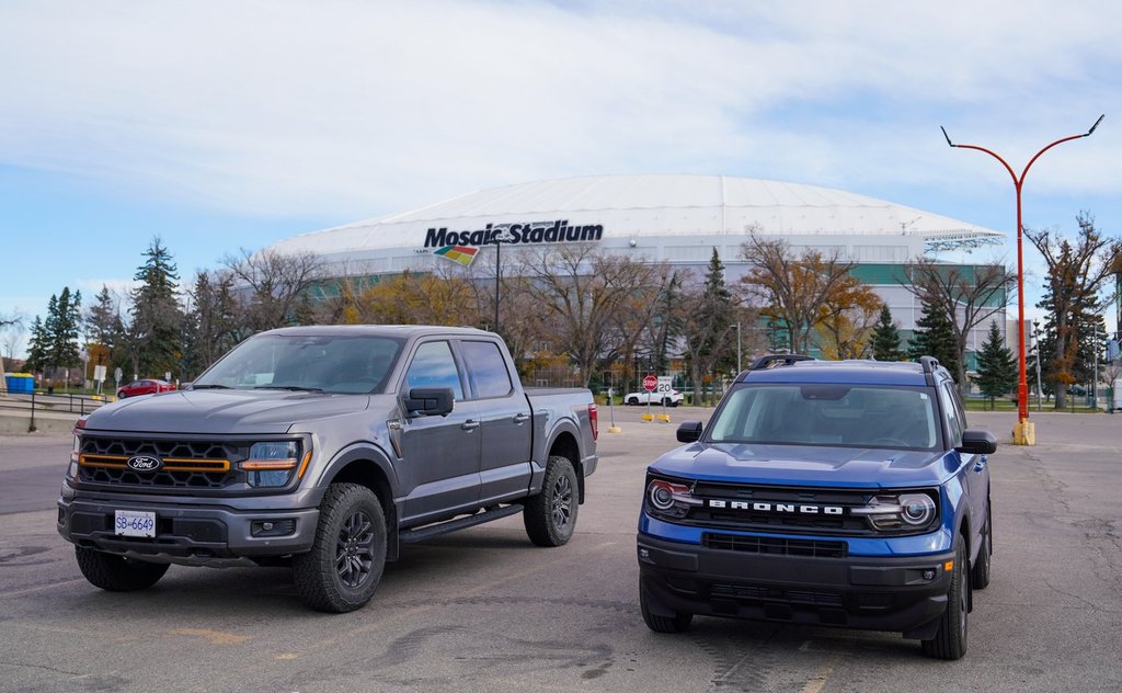 Vehicles are seen parked outside of Mosaic Stadium in Regina, on Monday, Oct. 27, 2025. 