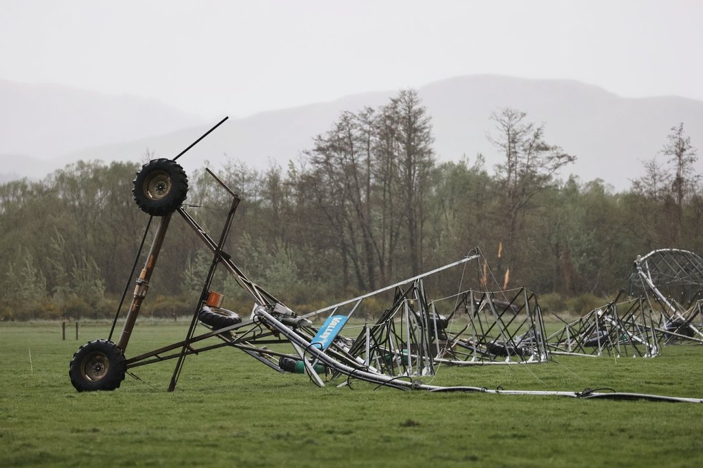 Farm irrigation equipment lays on the ground after it is damaged by strong winds in Waiau, New Zealand, Thursday, Oct. 23, 2025. (Chris Skelton/STUFF via AP).