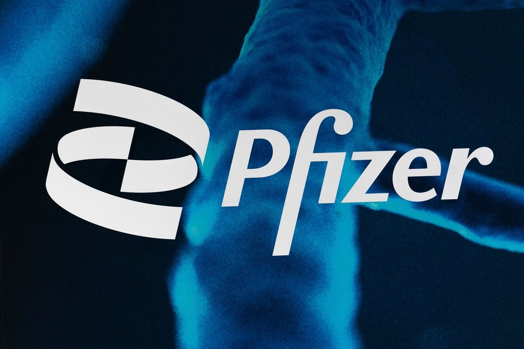FILE - The Pfizer logo is displayed at the company's headquarters, Friday, Feb. 5, 2021, in New York. (AP Photo/Mark Lennihan, File).