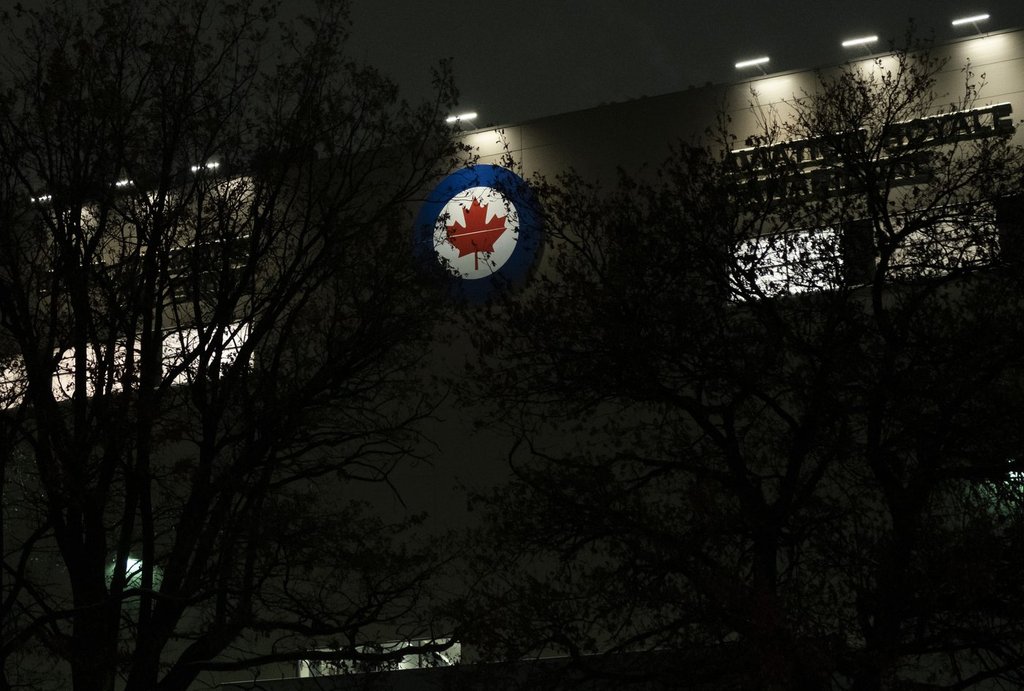 The Royal Canadian Air Force roundel is illuminated on a building at CFB Trenton, in Trenton, Ont., on February 6, 2020. THE CANADIAN PRESS/Justin Tang.