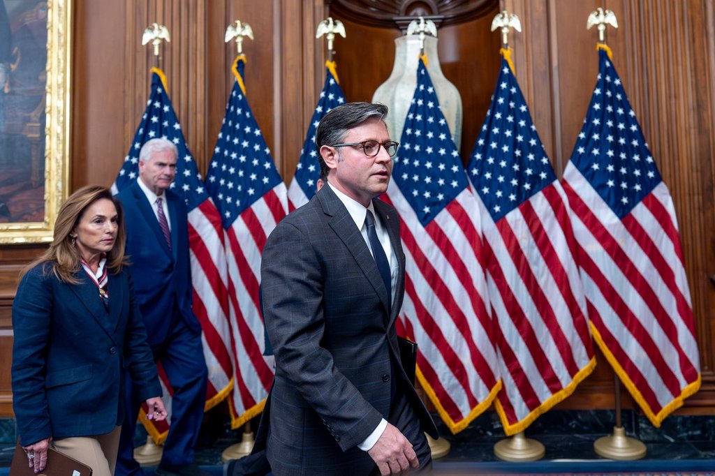 Speaker of the House Mike Johnson, R-La., center, joined from left by Rep. Lisa McClain, R-Mich., chair of the House Republican Conference, and House Majority Whip Tom Emmer, R-Minn., wrap up a news conference on day 23 of the government shutdown, at the Capitol in Washington, Thursday, Oct. 23, 2025. (AP Photo/J. Scott Applewhite).