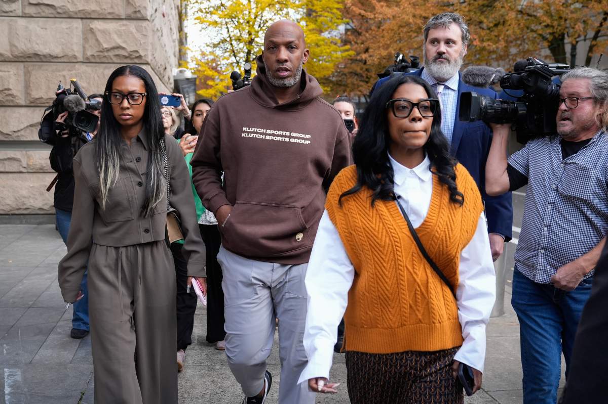 Portland Trail Blazers head coach Chauncey Billups walks to a vehicle after his federal court appearance on Thursday, Oct. 23, 2025, in Portland, Ore.