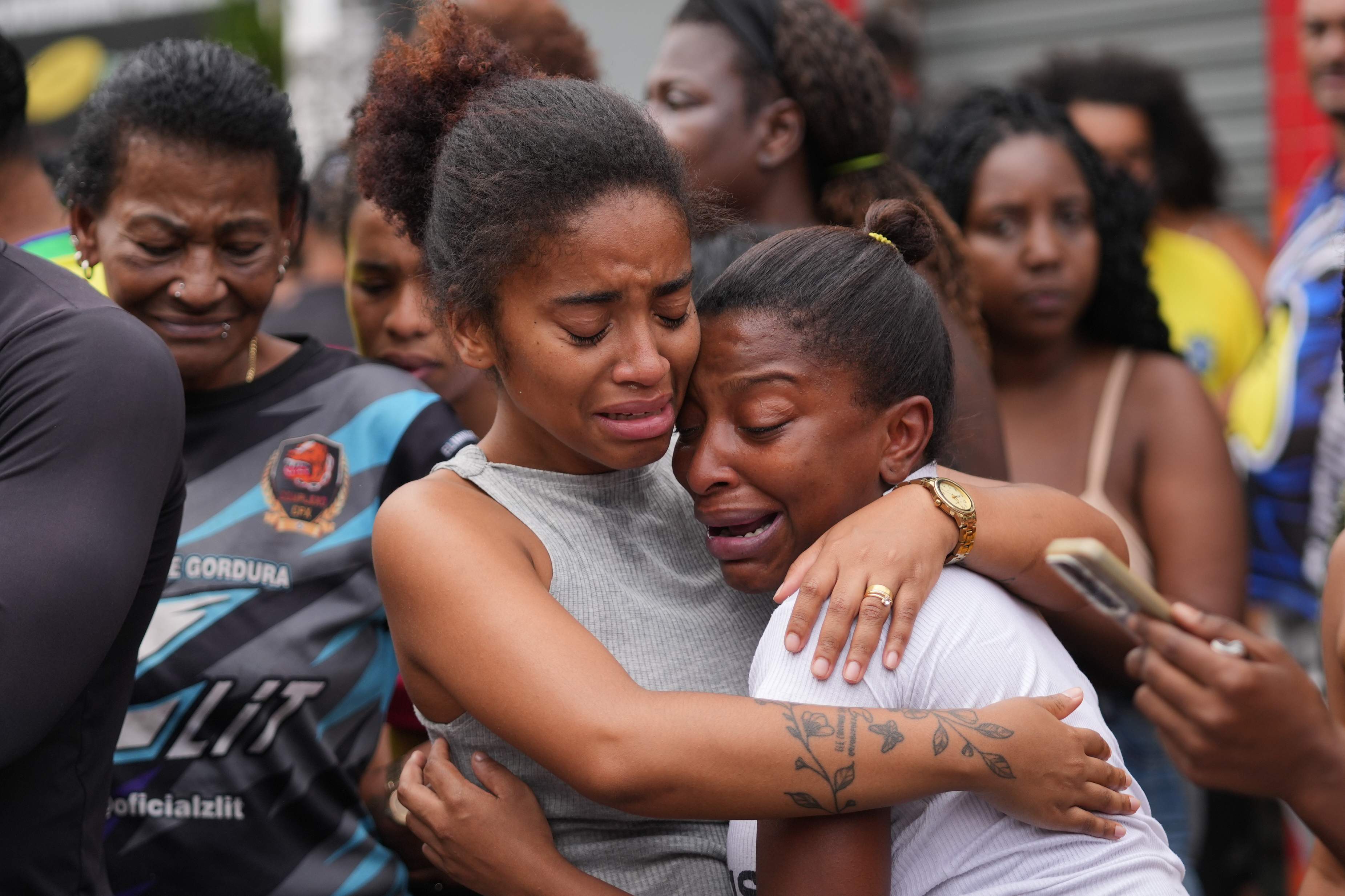 At least 119 dead in Brazil police raid, bodies line streets as locals mourn
