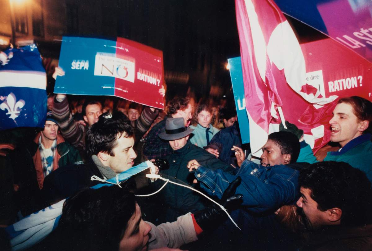 Yes and No supporters clash on the streets of Montreal, Monday, Oct. 30, 1995, as the No side won a narrow victory in the province’s referendum.